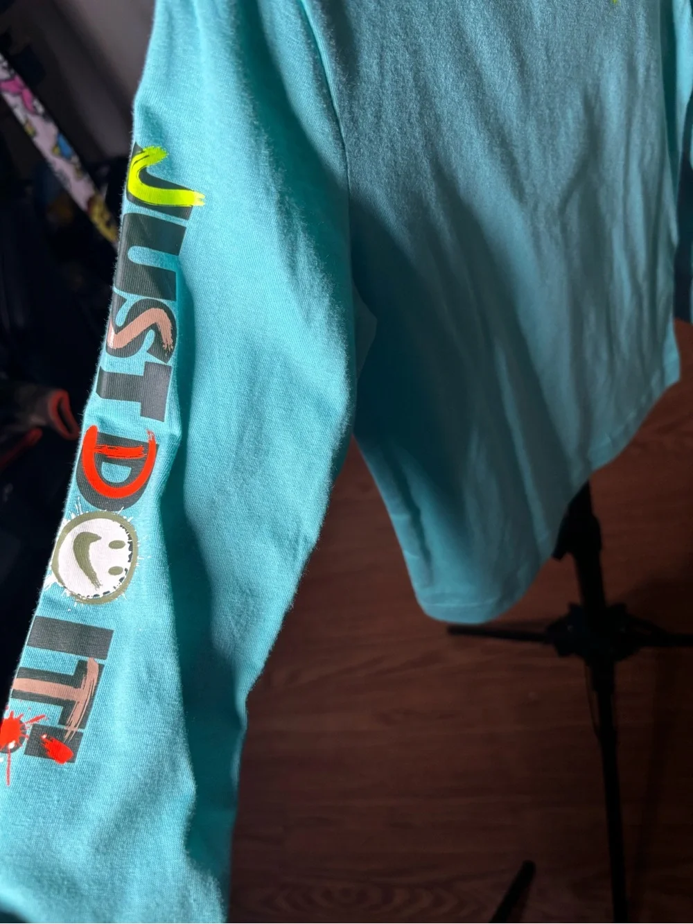 Nike Teal Long-Sleeve Graphic Tee with Multicolor Swoosh